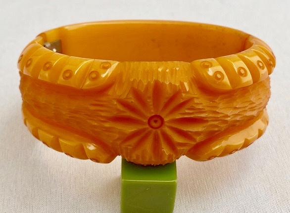 BB240 hinged carved apricot bakelite bracelet